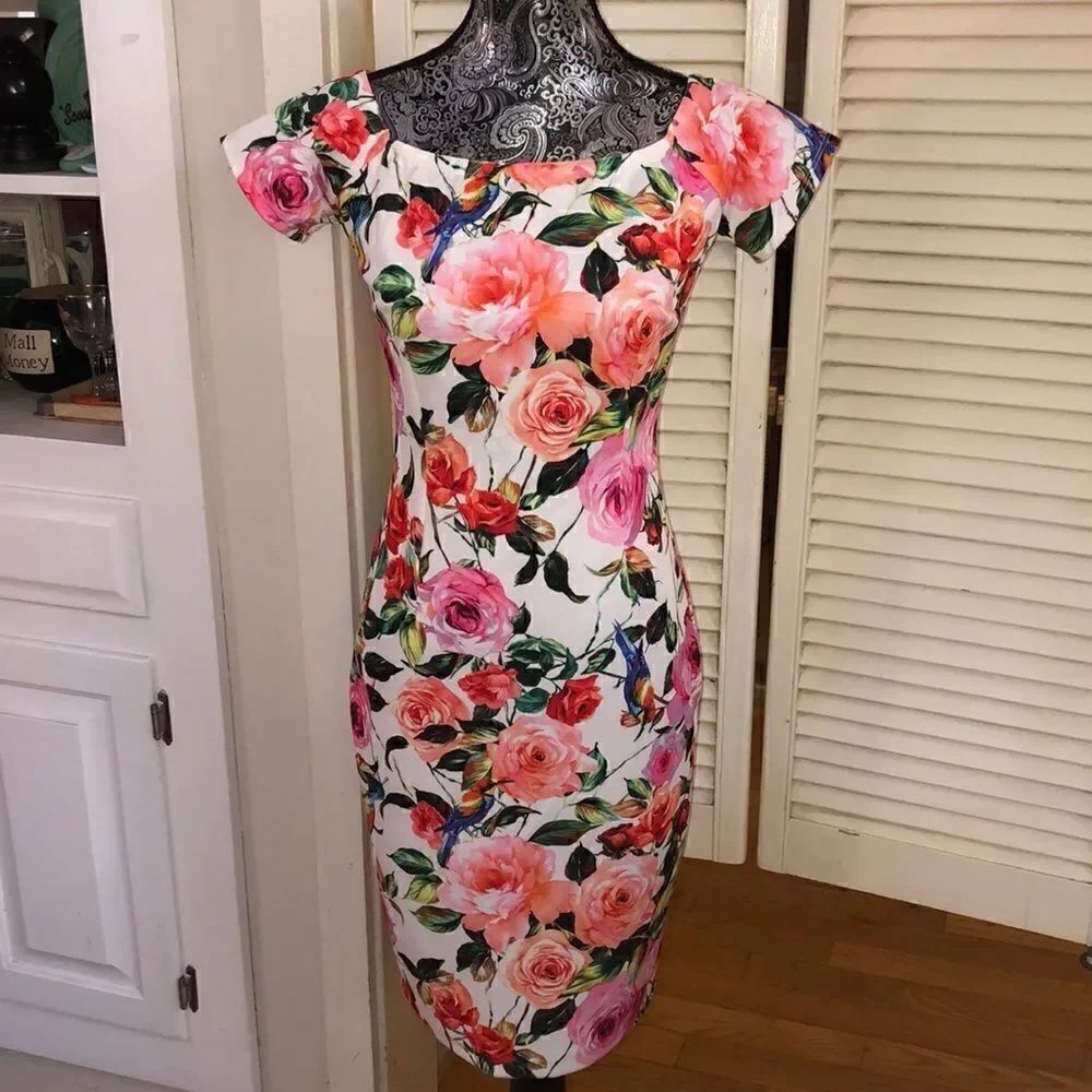 Stunning Floral Paradise Bodycon Midi Dress by Alexia Admore. All eyes on you!